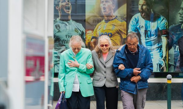 elderly group helping eachother